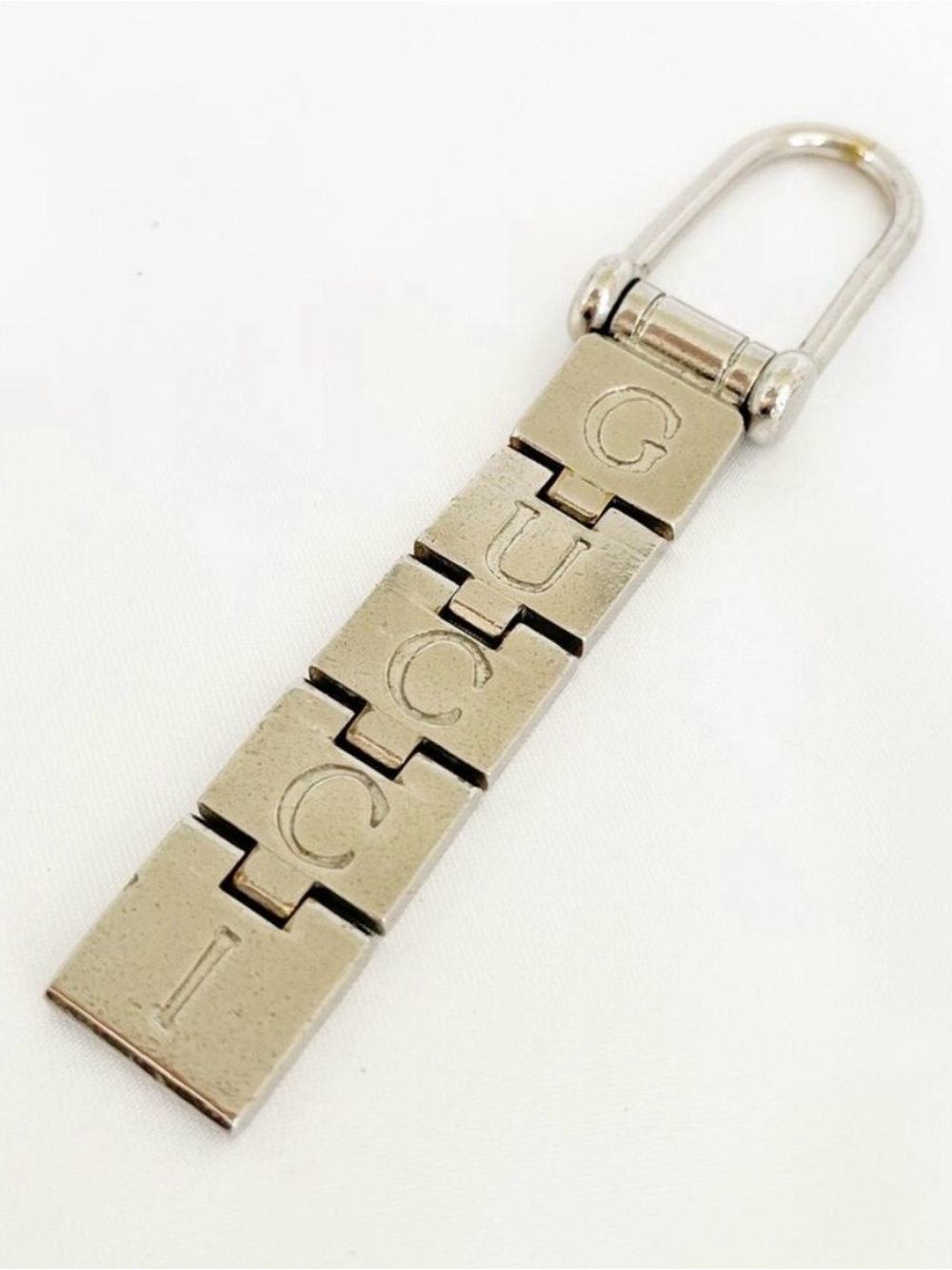 Vintage 1990s Gucci Articulated GUCCI Logo Keychain Silver Tone Made in Italy Ra